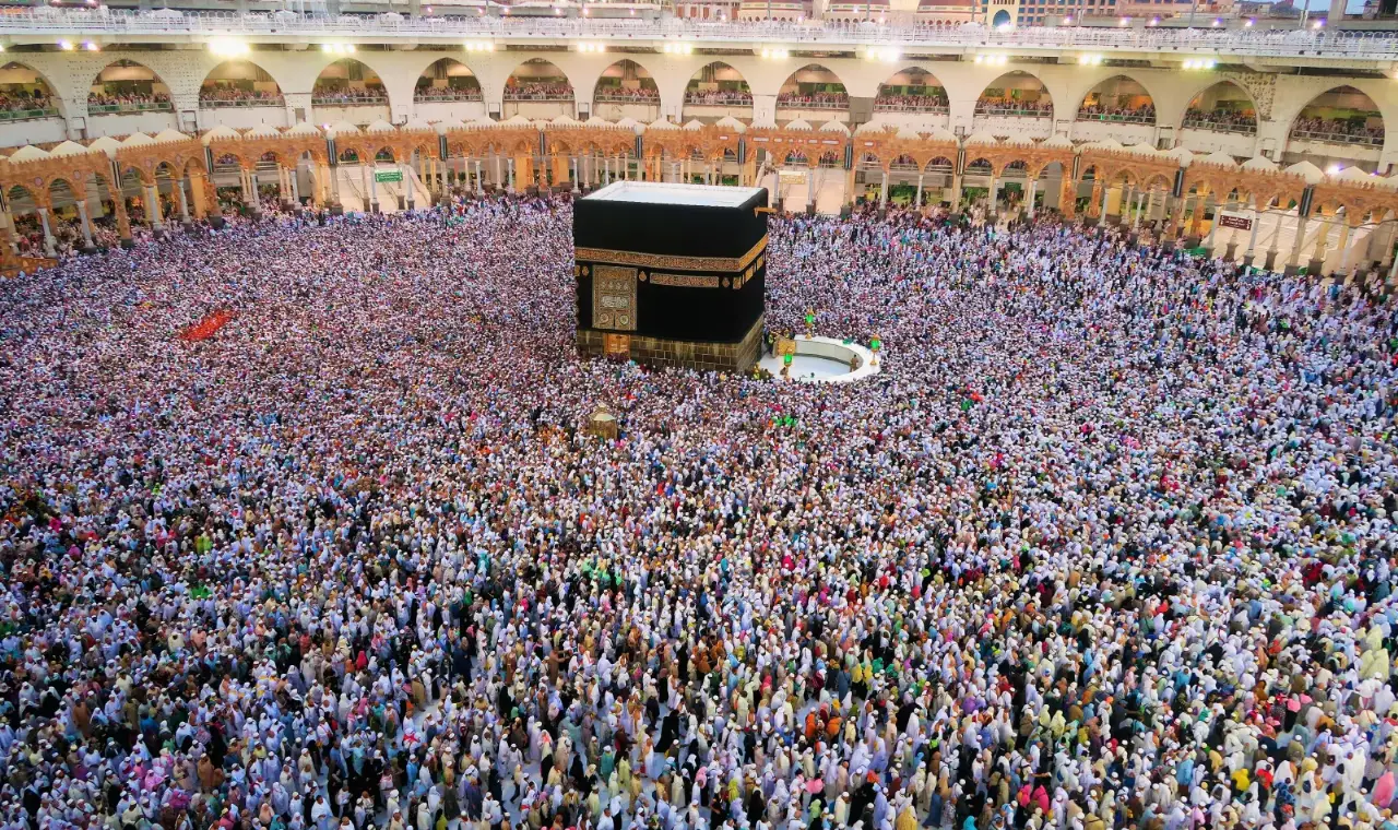 Pilgrims praying inside Masjid-ul-Haram courtyard